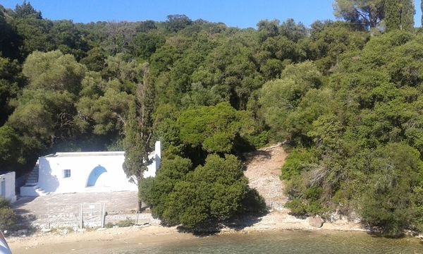 Skorpios, the private Onassis island in the Ionian Sea, seen from the water